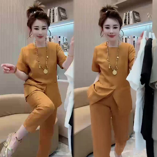 简约净版时尚套装女2026春夏季新款前开叉半袖+束脚裤两件套装潮