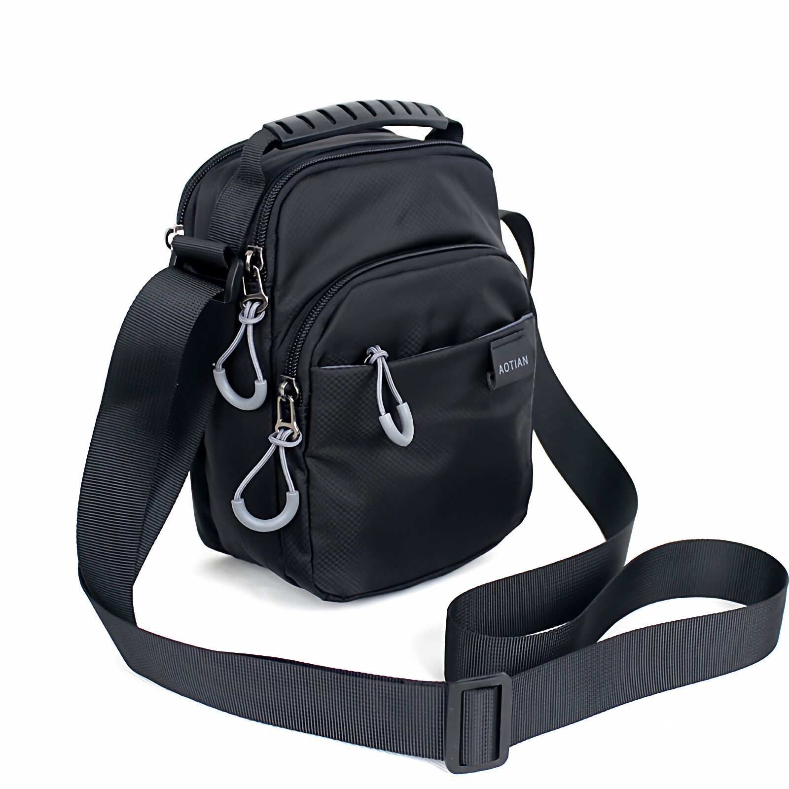 2026春夏新款防水尼龙布休闲青年男士纯色竖款背包单肩斜跨迷你包