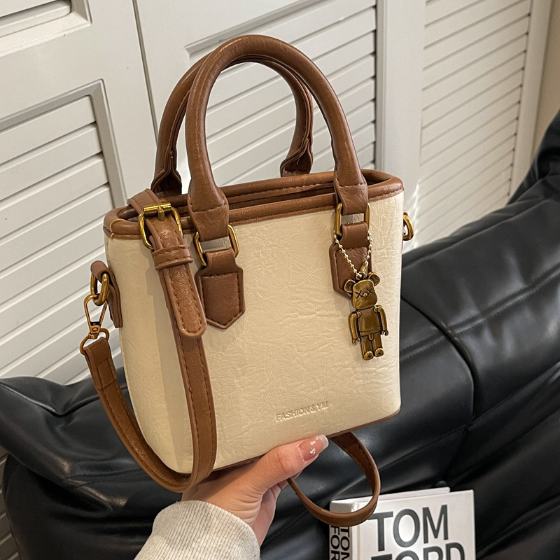 流行爆款手提水桶包撞色斜挎包