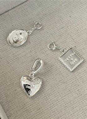 S925纯银韩版小众设计白银色时尚吊坠个性简约时髦心形字母侧坠