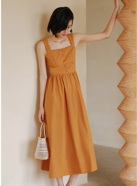 弥古橙色吊带裙三亚海边度假连衣裙女夏高级感沙滩裙法式收腰长裙