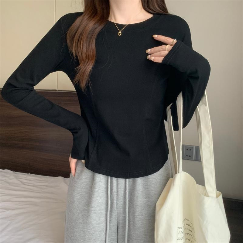 黑色新款鱼骨弧形下摆长袖t恤女2026秋季设计感收腰打底衫上衣潮