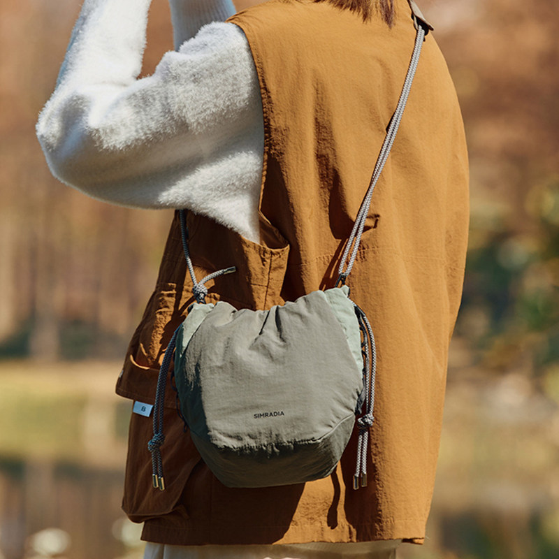 简约山系束口相机包摄影镜头单反收纳包休闲单肩包斜挎包女ins风