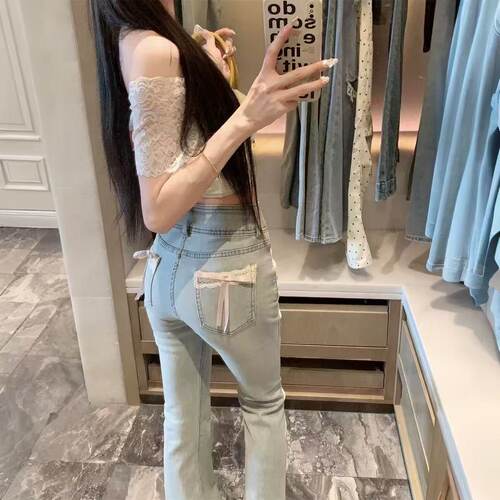 蕾丝拼接微喇牛仔裤丰胯显瘦大码胖mm设计感蝴蝶结裤子韩系慵懒风