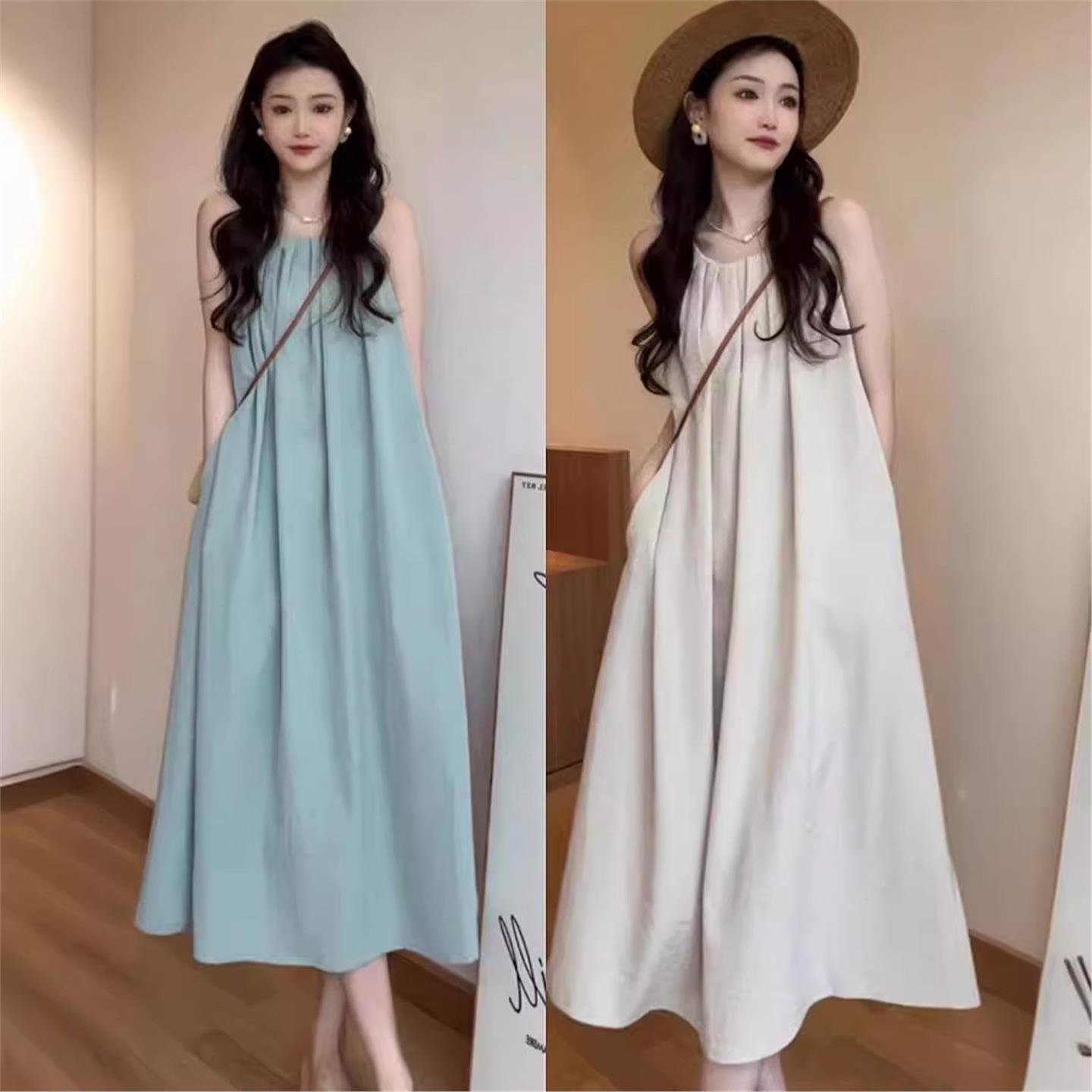 法式温柔风挂脖无袖露背连衣裙女装2025夏季新款设计感沙滩长裙子