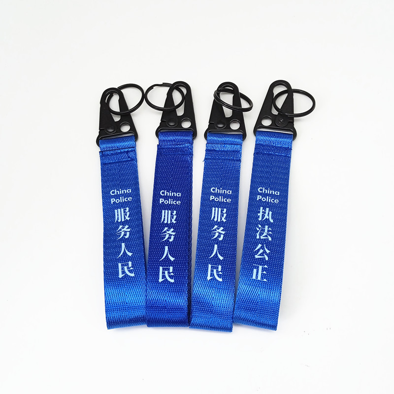 厂家直销爱国励志双面绣花织带鹰嘴钥匙扣箱包帽挂饰摩托车钥匙绳