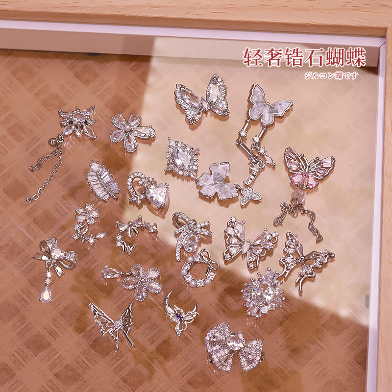 TG09美甲饰品爆闪蝴蝶锆石立体浮雕指甲装饰配件银色蝴蝶结钻饰品