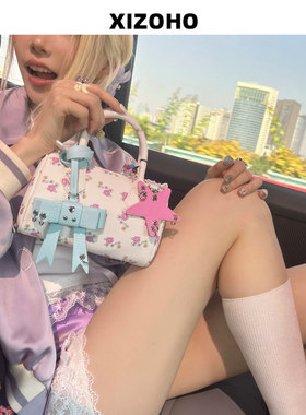 碎花枕头包女2025新款高级感小众设计蝴蝶结手提包单肩斜挎小方包