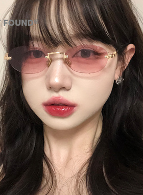 优雅椭圆无框粉镜片女士遮阳镜