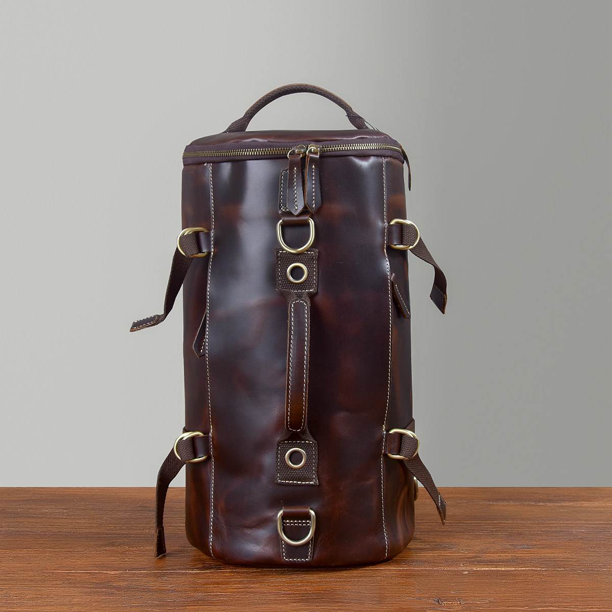 多功能复古牛皮双肩包通勤酷帅真皮斜挎水桶包男包疯马旅行小背包