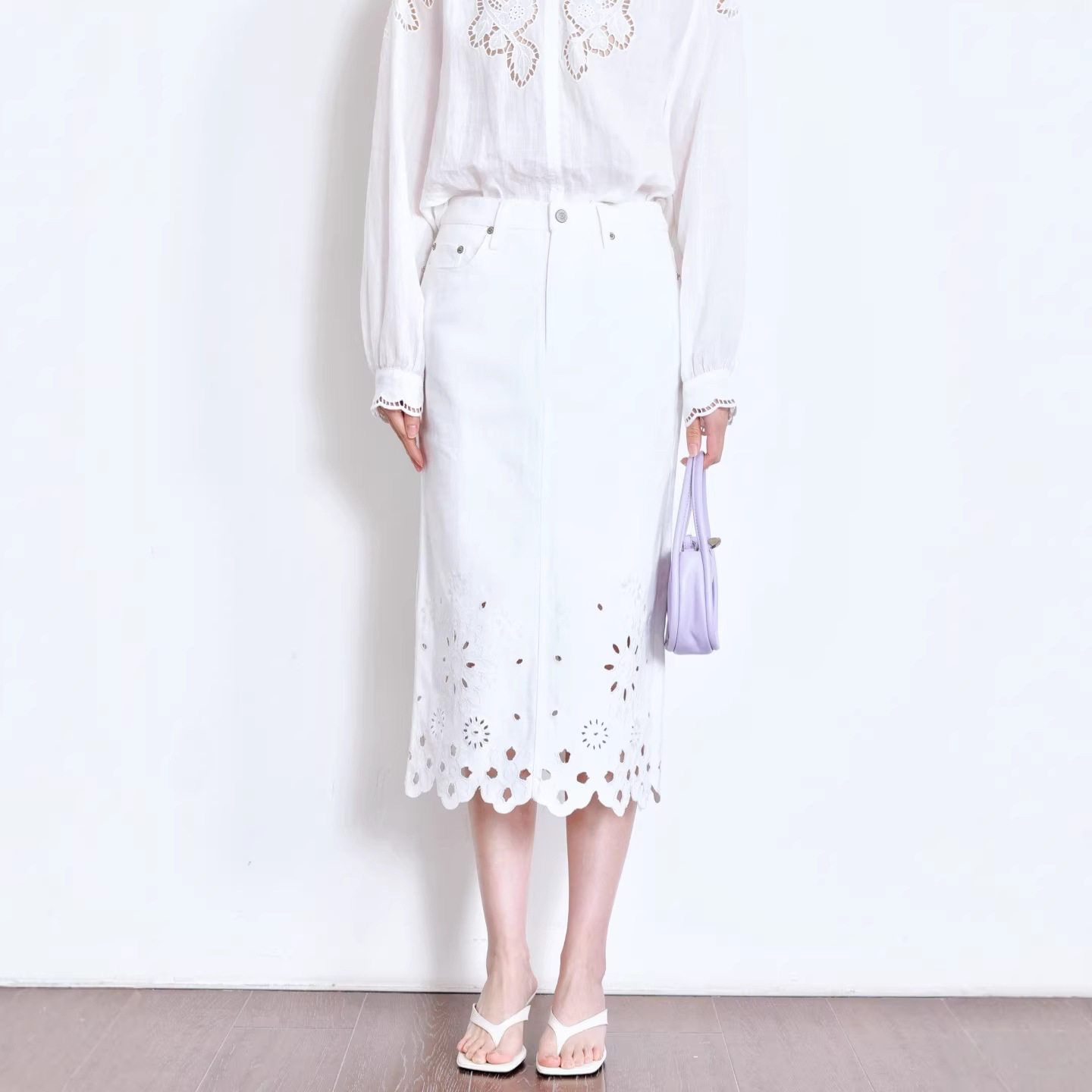 南油品质法式重工镂空刺绣白色半身裙女2026高腰显瘦中长款直筒裙