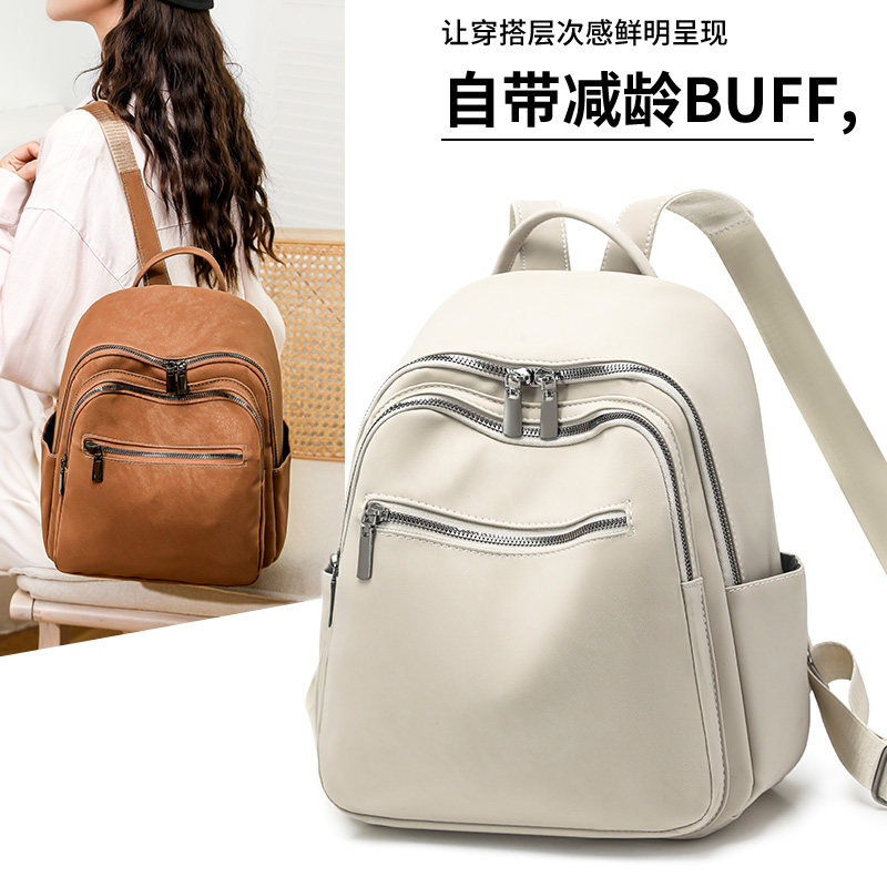 休闲简约风双肩包女气质款通勤百搭书包高质感软皮大容量旅行背包