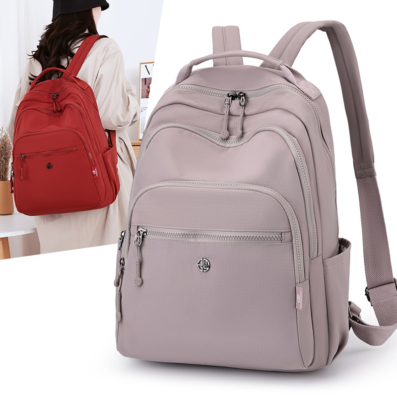 休闲简约风女士2026新款双肩包大容量轻便减压书包通勤旅行背包