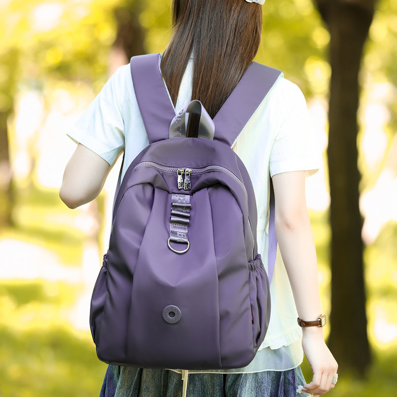 休闲简约款双肩包女轻便大容量通勤书包多隔层日常通勤旅行背包