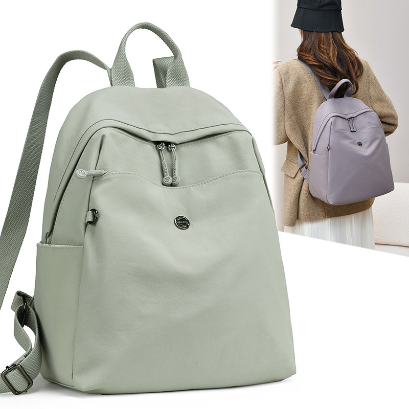 简约休闲双肩包女2026新款大容量轻便时尚减负旅行背包高颜值书包
