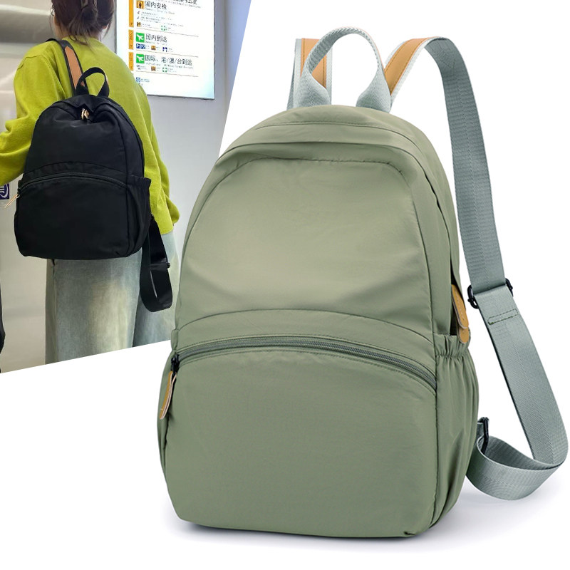 纯色简约风双肩包男女通用大容量轻便防水旅行书包休闲耐磨背包