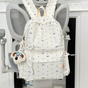 甜美学院风背包蝴蝶结波点双肩包小学初中高中生护脊减负轻便书包