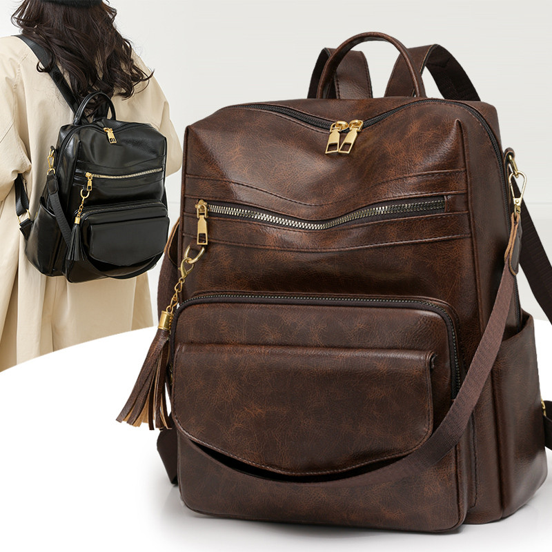 女士双肩背包2025新款PU漆面软皮通勤书包单肩包两用多隔层大容量