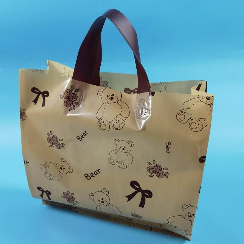 2025年卡通儿童服装袋小熊塑料袋服装店手提袋礼品购物袋