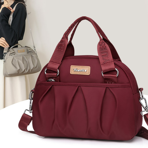 大容量多层手提斜挎包妈妈手拎包