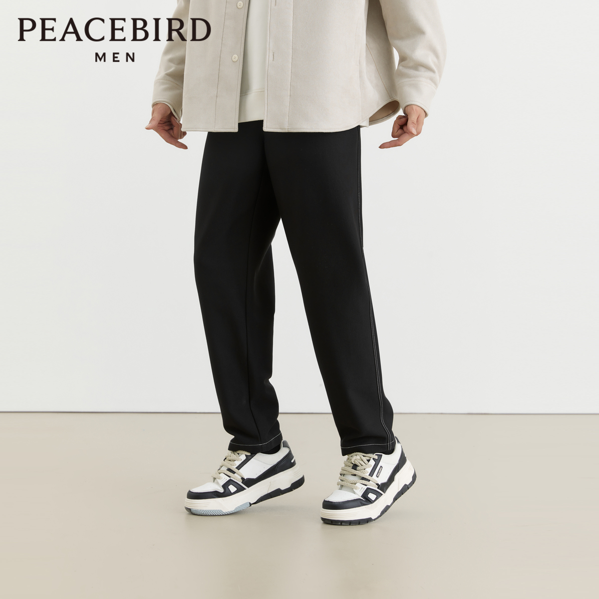 【商场同款】太平鸟男装 潮流明线黑色锥形休闲长裤男B2GBD4135