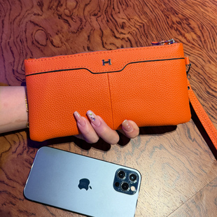 纯牛皮便携手拿包小手包休闲百搭真皮手机零钱包散步买菜手拎包女