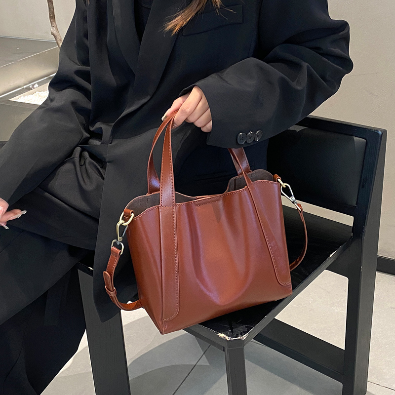 纯牛皮大容量斜挎手提包女简约2026新款真皮休闲托特包内胆包可拆