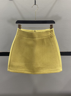 黄色毛呢半身裙女2025秋冬新款设计感三粒扣宽松显瘦a字包臀短裙