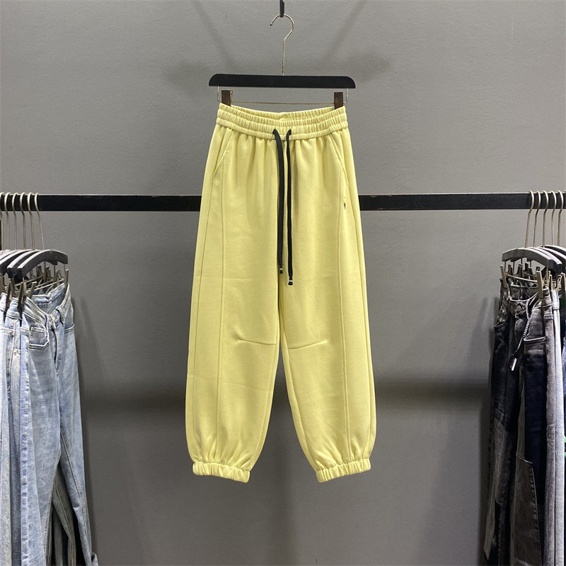 黄色休闲卫裤女2026春季新款松紧腰宽松显瘦九分束脚运动裤哈伦裤