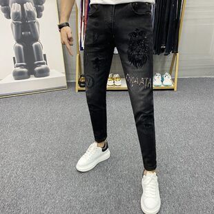 秋冬新款潮牌牛仔裤男士重工烫钻印花高端时尚修身百搭小脚长裤子