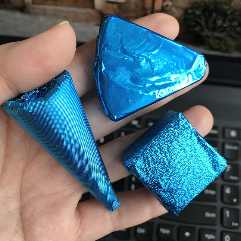 天蓝色锡纸光亮面细格纹乌发丸普洱茶叶小柑橘糖果巧克力包装铝箔