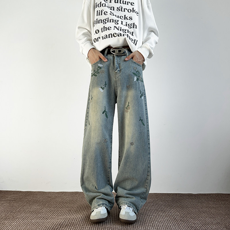 美式绣花弯刀牛仔裤男女设计感2025年秋季宽松青少年直筒阔腿裤子