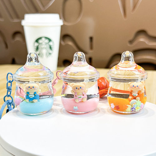 新款创意流沙挂件背带坐姿熊入油漂浮钥匙扣可爱漂流瓶女生小吊坠
