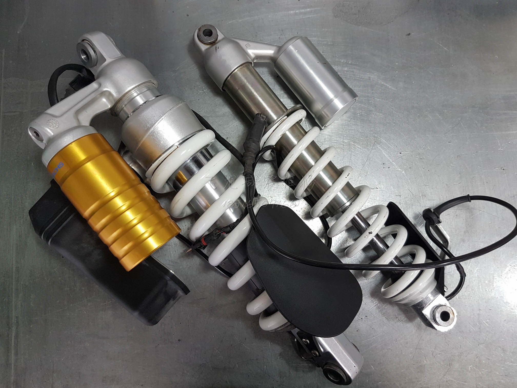 宝马水鸟电子减震维修避震漏油