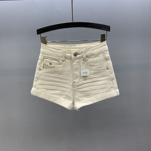 显瘦辣妹包臀热裤 高腰a字修身 女2026春夏新款 米白色卷边牛仔短裤