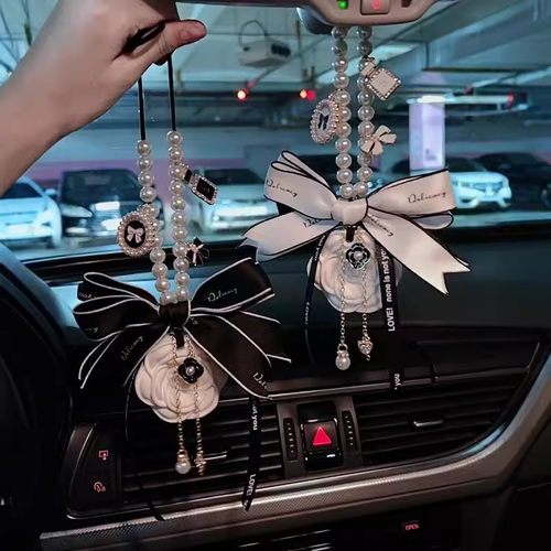 汽车挂件2025新款高端后视镜吊坠网红女扩香石山茶花香薰车载挂饰