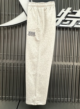特步2025冬季新款简约运动HHR字母印花长裤男休闲裤975429630177