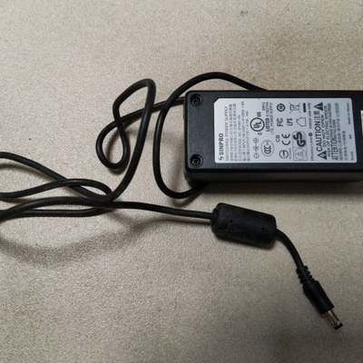 寻《《原装台湾SINPRO电源适配器，型号SPR03-105，输入