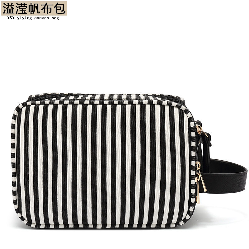 欧美时尚洗漱包小休闲女士化妆包防水多功能帆布手拿包手机袋