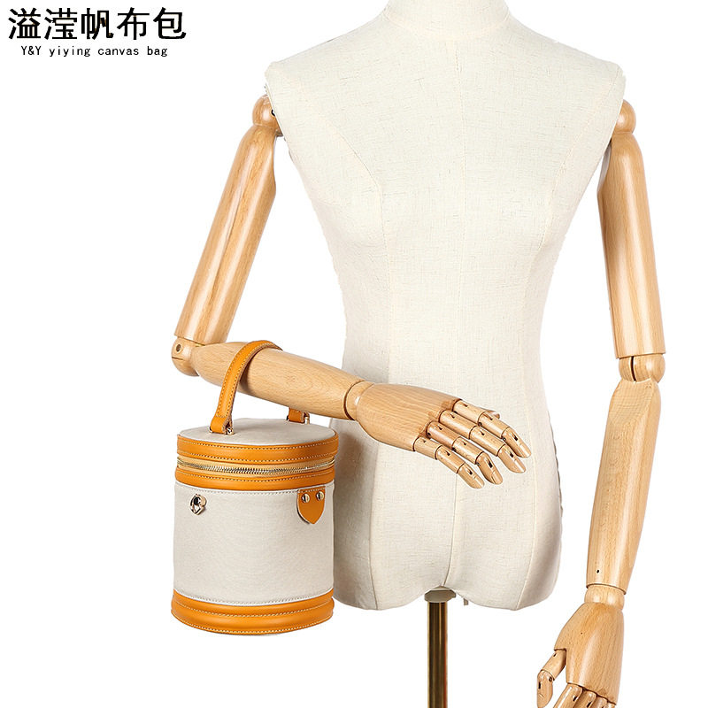 欧美时尚休闲女手提包 防水帆布斜跨包 配头层真皮纯色单肩包溢滢