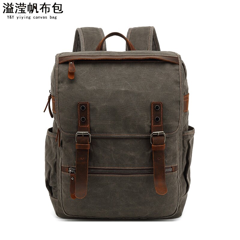 欧美时尚男士双肩旅行包跨境学生书背包防泼水油蜡帆布配疯马皮
