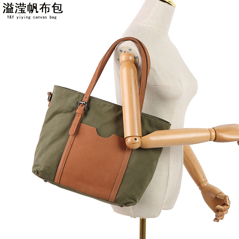 欧美时尚休闲女手提包 防水帆布斜跨包 配头层真皮纯色单肩包溢滢
