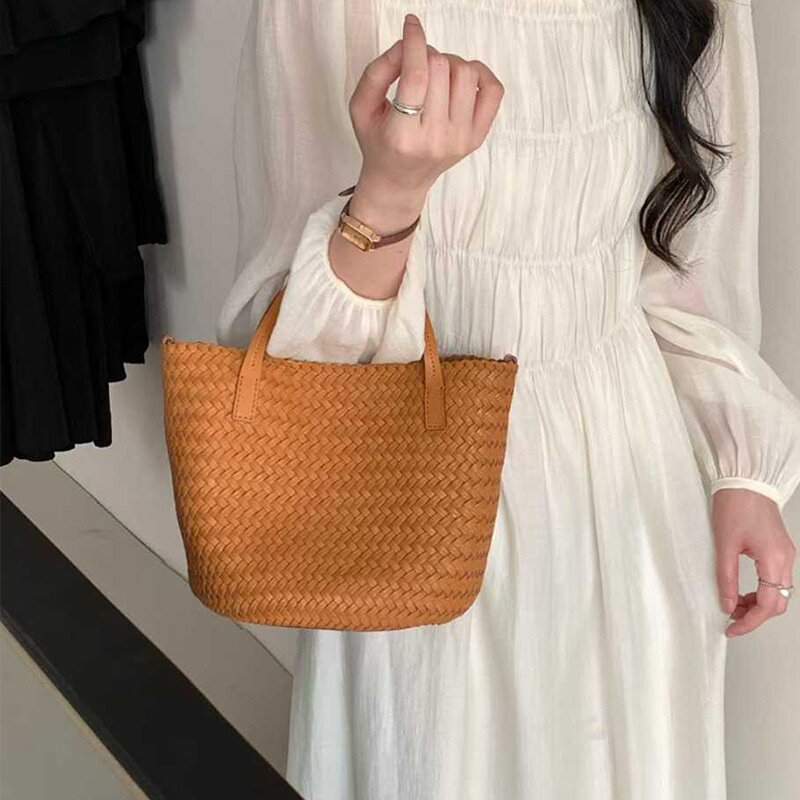 旅行通勤手工真皮编织包女2025新款度假风手提小众头层牛皮女包斜