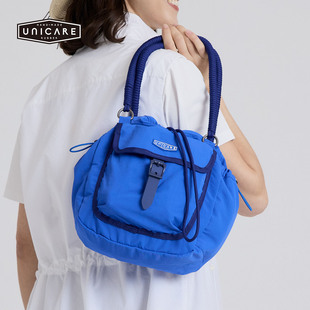 UNICARE运动休闲户外复古旅行包 男女手拎手拎单肩斜挎包2026新品
