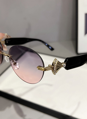 墨镜2025新款潮女太阳镜圆脸网红款时尚防紫外线开车无框眼镜显瘦
