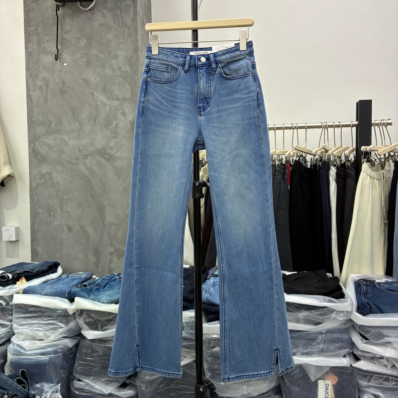 代嘉儿欧货25冬百搭显瘦加绒微喇牛仔裤女休闲裤脚开叉长裤60685