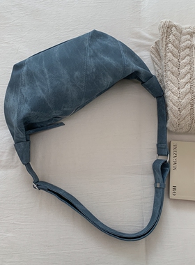 蓝色小众设计感拼接斜挎饺子包2025新款潮百搭时尚小包包通勤包