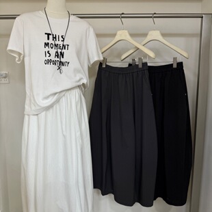 灰姑娘CICI 26年夏上新高腰松紧中长纯色花苞A字带内衬长裙88222