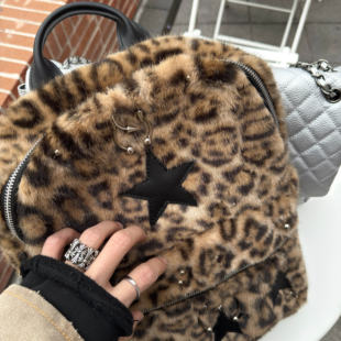 ROLLING MONEY25FW铆钉拉链可调节双色皮质双肩穿孔朋克街头书包