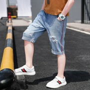 Quần short denim bé trai 2019 mùa hè có phần khoét lỗ mỏng trong quần trẻ em lớn 乞丐 mặc quần crop-top trẻ em - Quần